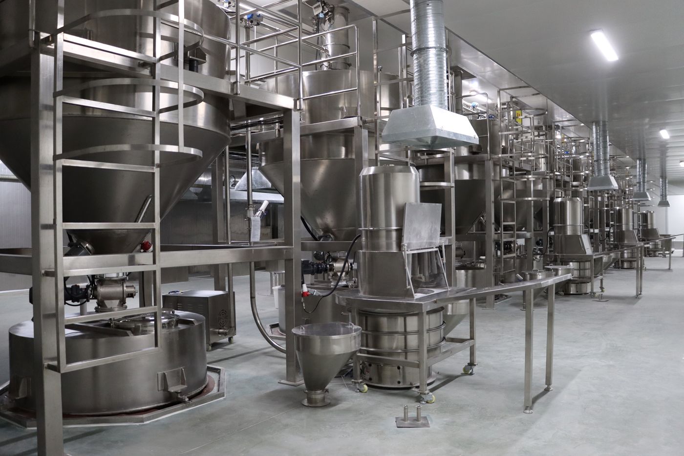 Yushengji blending and batching lines for powder, coating and marinade systems. Physically separated lines per